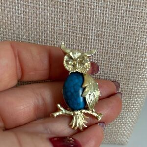 Charming Gold Owl Brooch with Blue Stone Detail